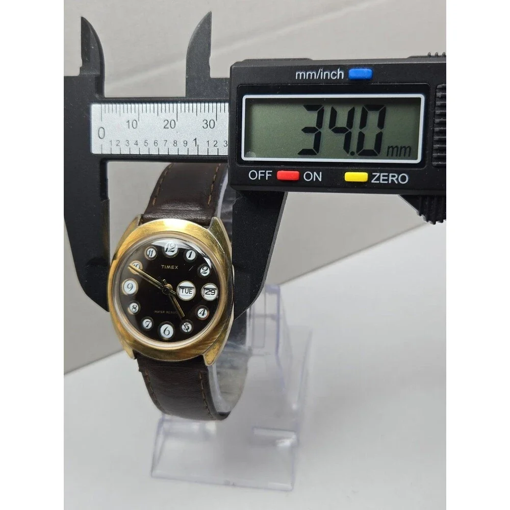 Vintage 1976 Timex Marlin Telephone Dial Day Date Hand Wind Gold Tone Mens Watch
